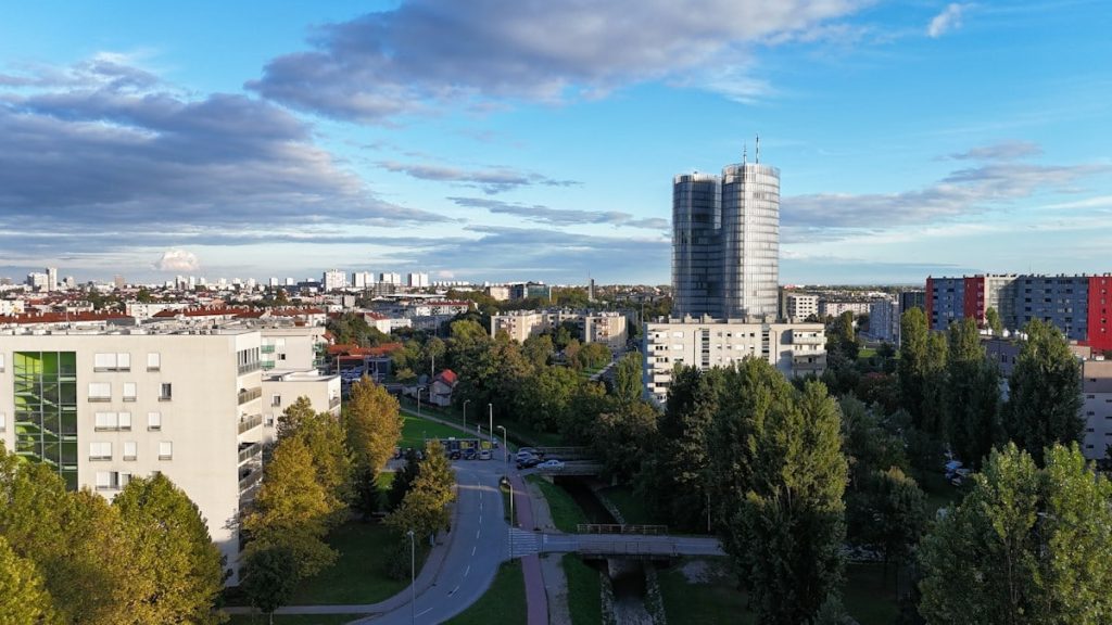 An aerial view of a city with tall buildings